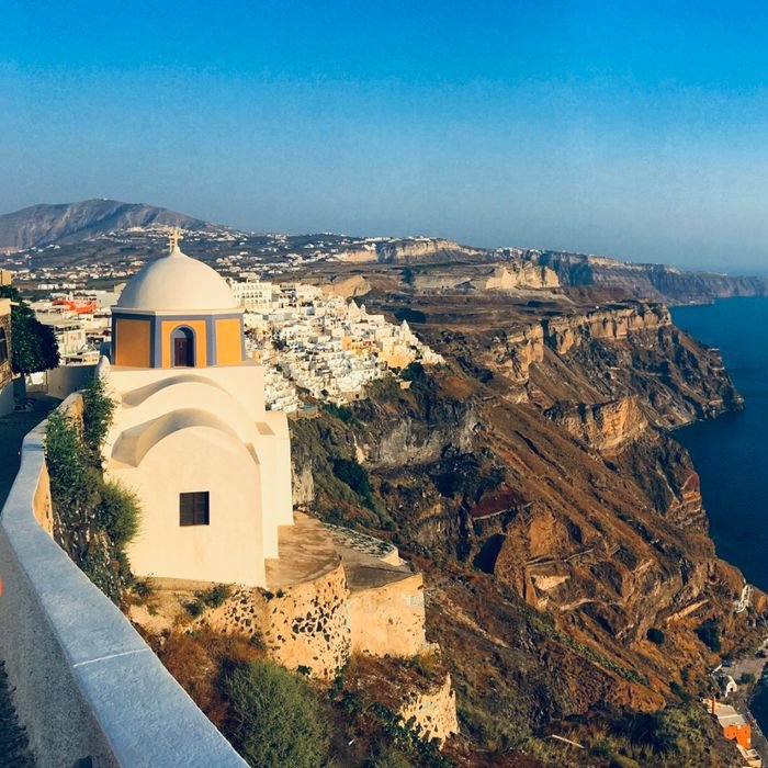 pexels photo 13607891 13607891 Stunning landscape of Santorini's iconic architecture overlooking the Aegean Sea.