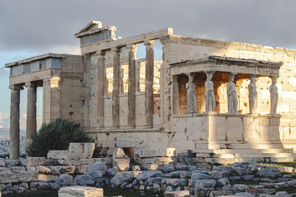 pexels photo 19910692 19910692 Ancient Erechtheion temple with caryatids at the Acropolis in Athens, Greece, illuminated by sunlight.